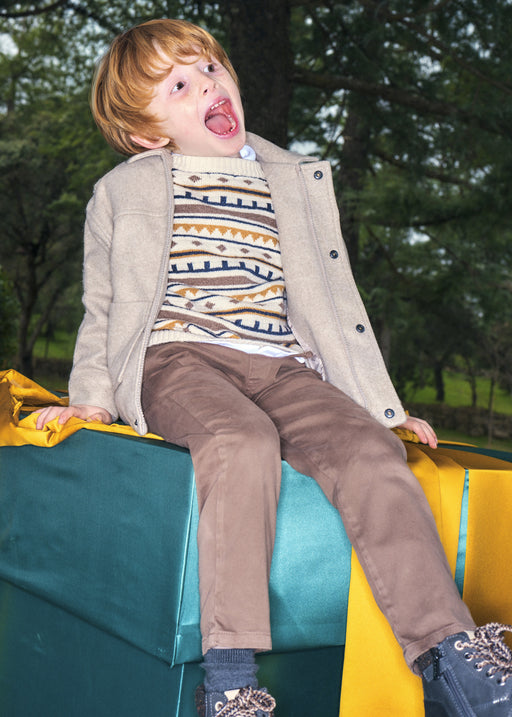 Mayoral Boys Slim Fit Chino Trousers in taupe - model styled with knit jumper and beige overshirt