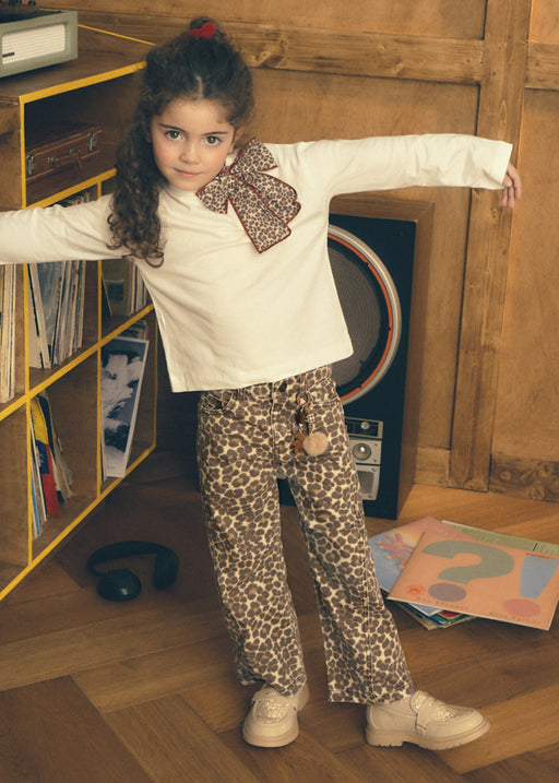 Mayoral Girls Leopard Print Wide Leg Jeans - model front view styled with white bow top