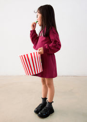 Mayoral Girls Amour Sequin 2-Piece Set - model side view with popcorn bag styled with black trainers