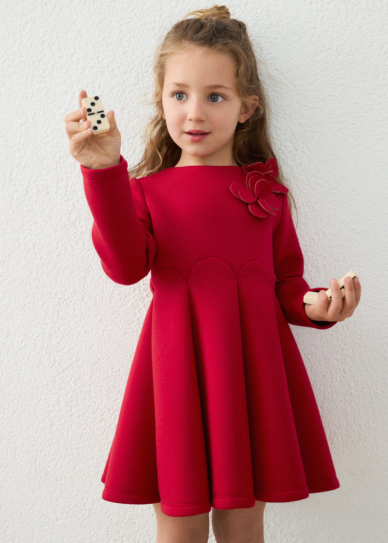 Mayoral Girls Red 3D Floral Fit & Flare Dress - model front view holding dominoes