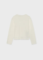 Girl wearing Mayoral CHIC sequin long sleeve top – portrait close-up
