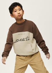 Boy wearing Mayoral Nukutavake Skate Lab sweatshirt – portrait close-up showing graphic print detail