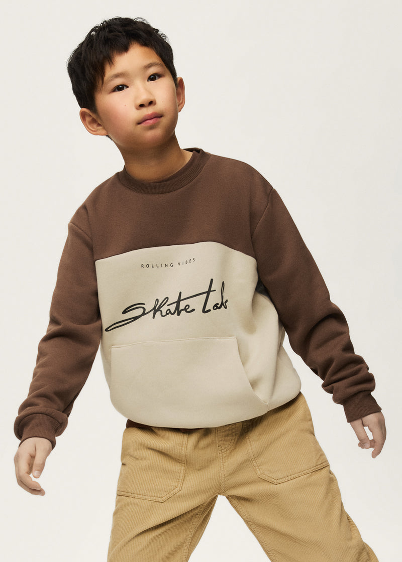 Boy wearing Mayoral Nukutavake Skate Lab sweatshirt – portrait close-up showing graphic print detail