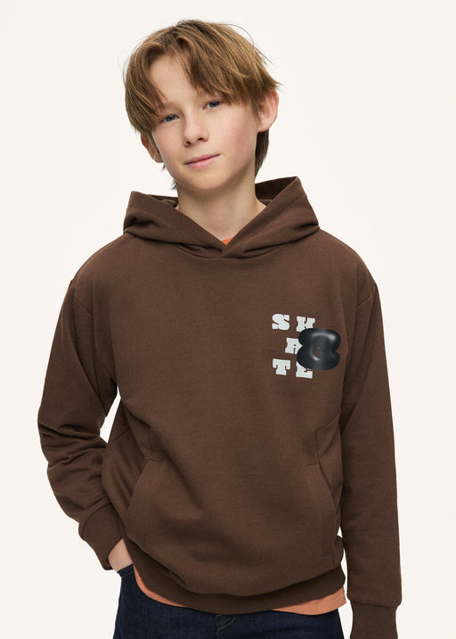 Boy wearing Mayoral Nukutavake Skate graphic hoodie – on model front view showing chest graphic