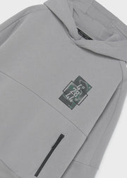 Mayoral Nukutavake tech coordinates hoodie – front flat lay showing both zip pockets and coordinates chest patch