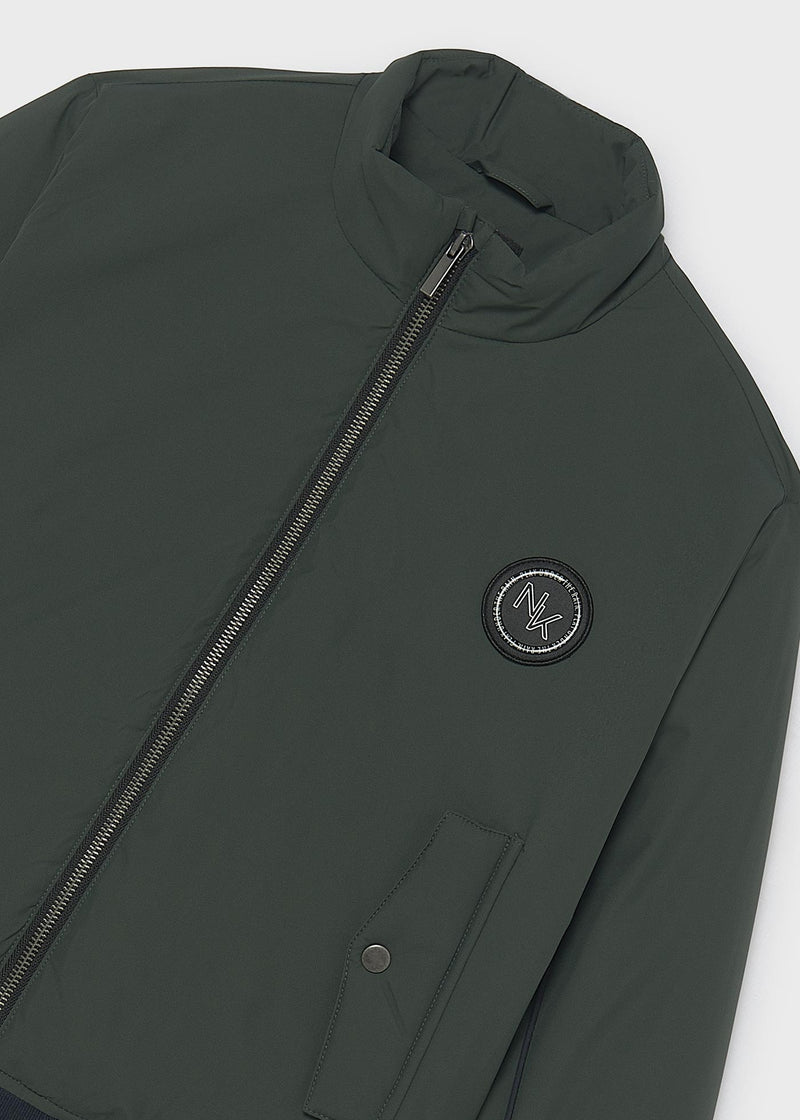 Mayoral Nukutavake forest green bomber jacket – front flat lay showing snap pockets and NK badge