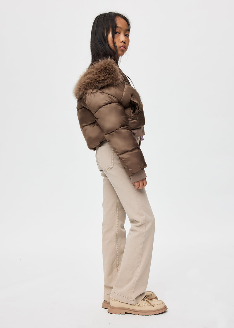 Girl wearing Mayoral khaki puffer jacket – side profile view showing cropped bomber silhouette and faux fur collar