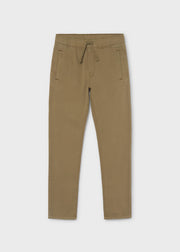 Mayoral boys khaki chino trousers – back welt pocket and tonal Mayoral leather patch badge detail close-up