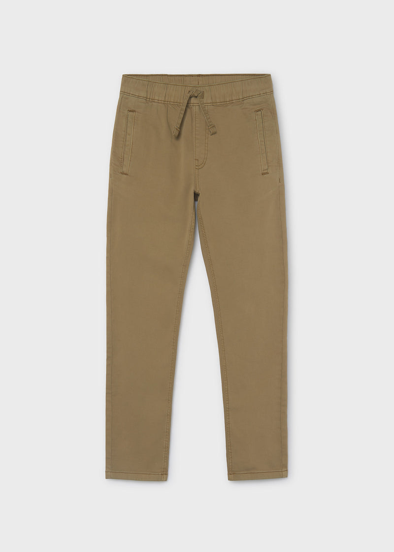 Mayoral boys khaki chino trousers – back welt pocket and tonal Mayoral leather patch badge detail close-up