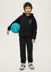Boy wearing Mayoral Nukutavake black camo joggers with grey tech hoodie – on model full body front view