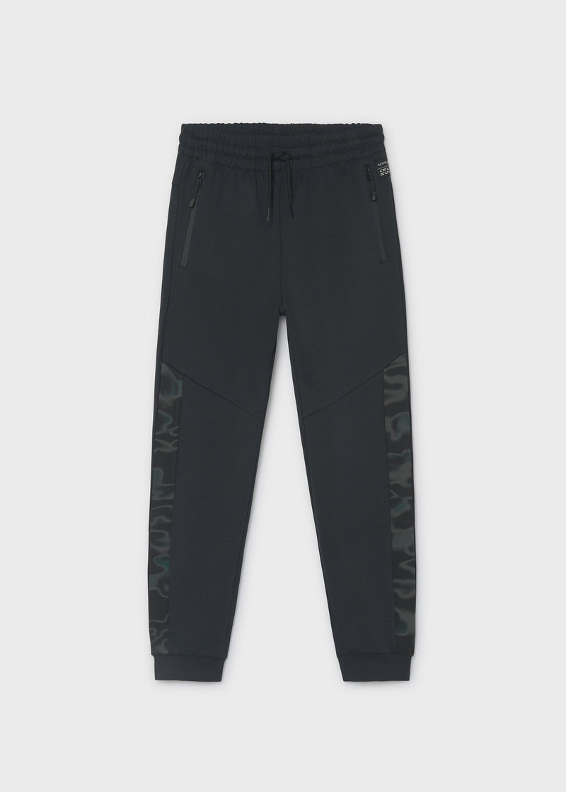 Mayoral Nukutavake black jogger trousers – elasticated drawstring waistband and Altitud Cero zip pocket badge detail close-up