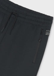 Mayoral Nukutavake black camo side panel joggers – front flat lay showing tonal camo graphic panel and zip pockets