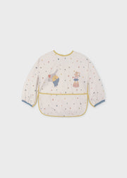 Mayoral baby circus star smock bib – close-up of elephant and juggling mouse circus appliqué characters with star print detail