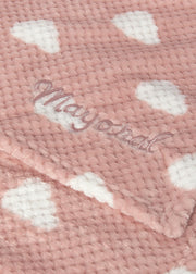 Mayoral baby cloud print fleece blanket – flat lay showing full blanket with all-over cream cloud print on blush pink and cream reverse corner fold
