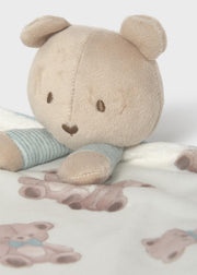 Mayoral baby teddy bear comforter – close-up of plush bear head showing embroidered eyes, nose and heart-shaped mouth with blue stripe ribbed arms and teddy print blanket detail