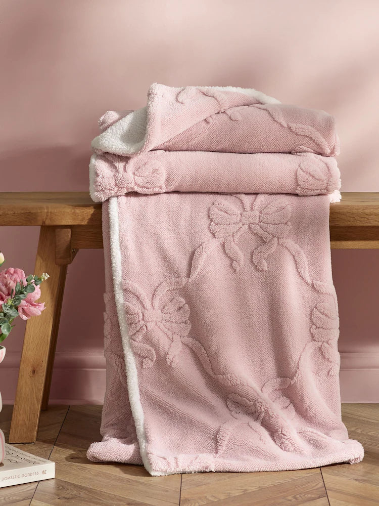 Catherine Lansfield Carved Bow Throw | Pink