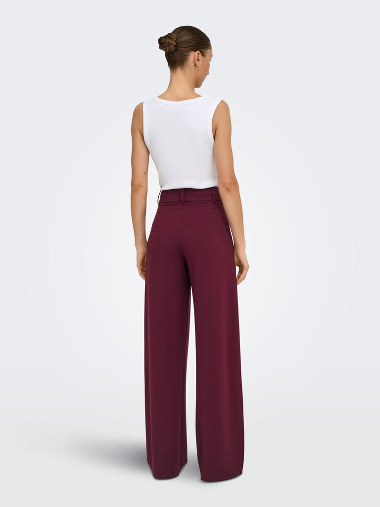 JDY wide leg jersey trousers in burgundy - front on model full length