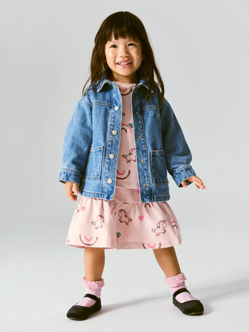 Name It Girls Unicorn Rainbow Print Skirt – model wearing with denim jacket